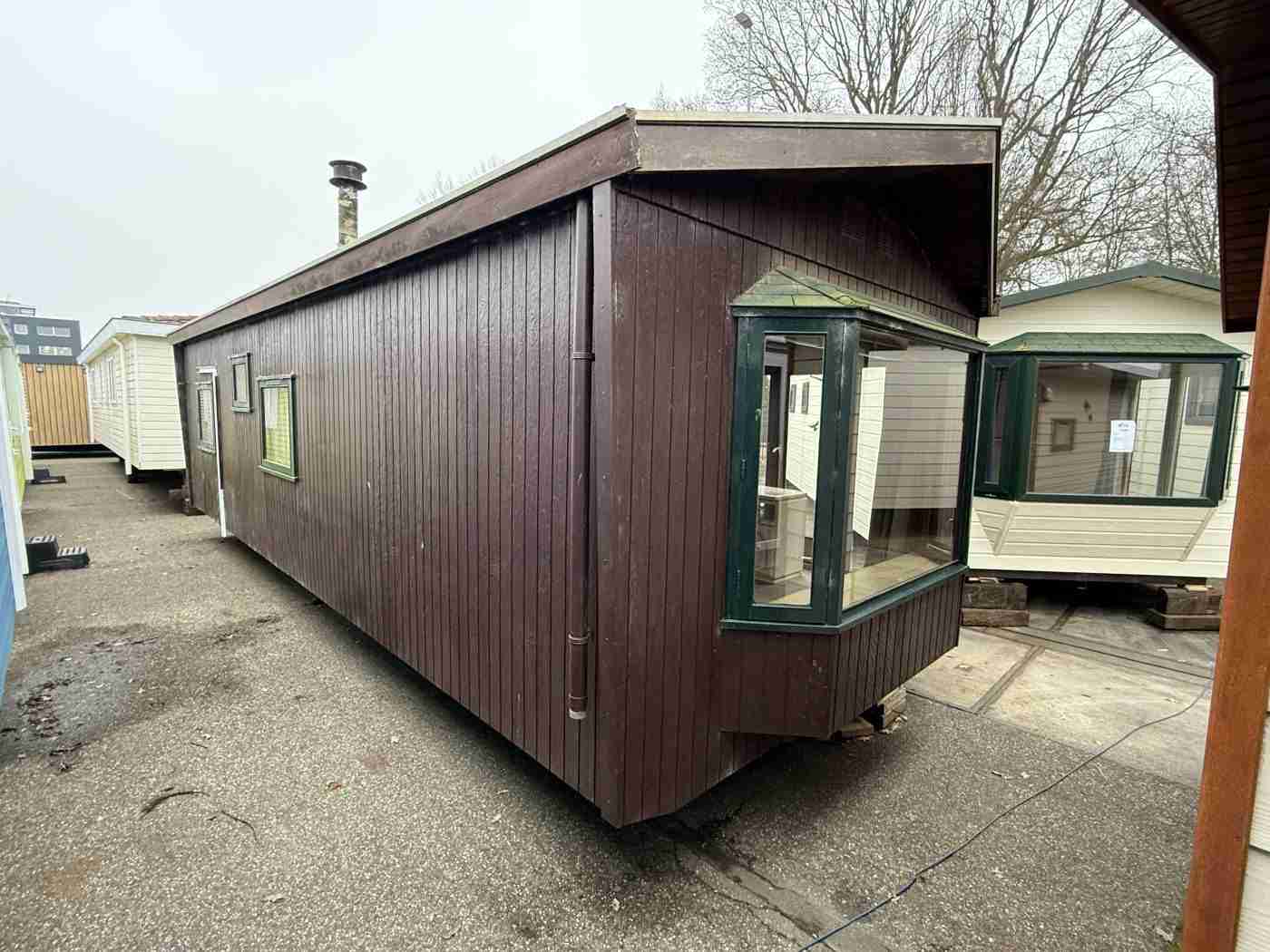 Houten Chalet 10 x 3.60 m foto 11