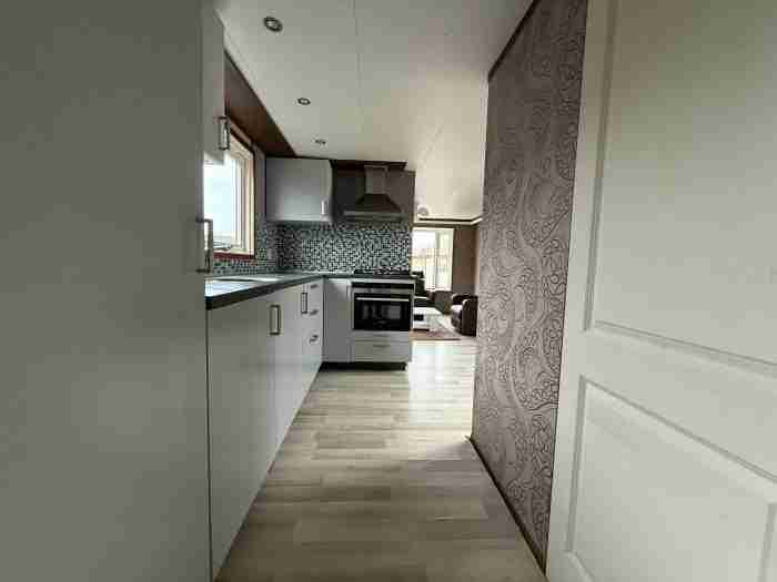 Kunststof Chalet 10.30 x 3.60 m foto 13