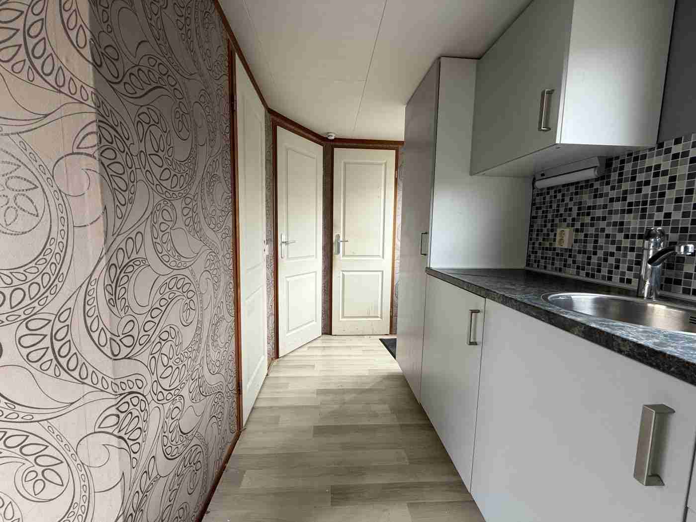 Kunststof Chalet 10.30 x 3.60 m foto 4
