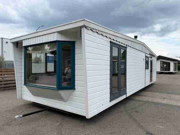 Carbouw Chalet 11.50 x 3.70 m foto 16