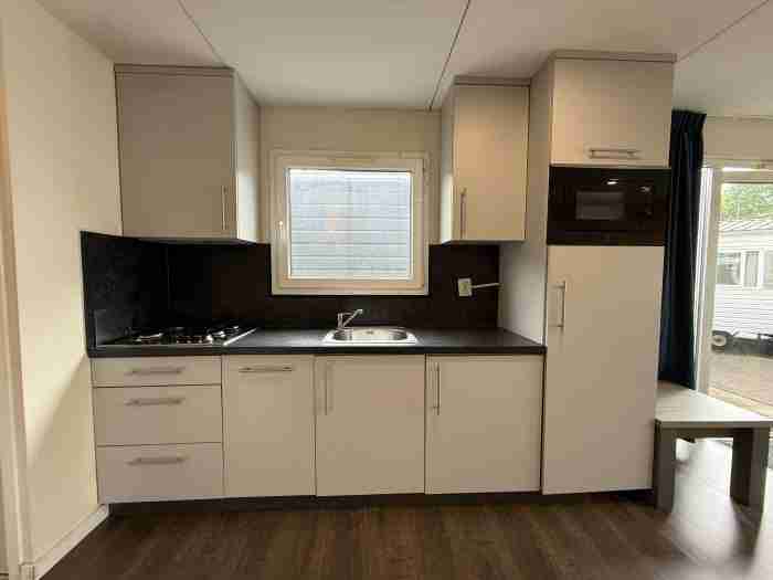 Kunststof Chalet 10.70 x 4 m foto 8